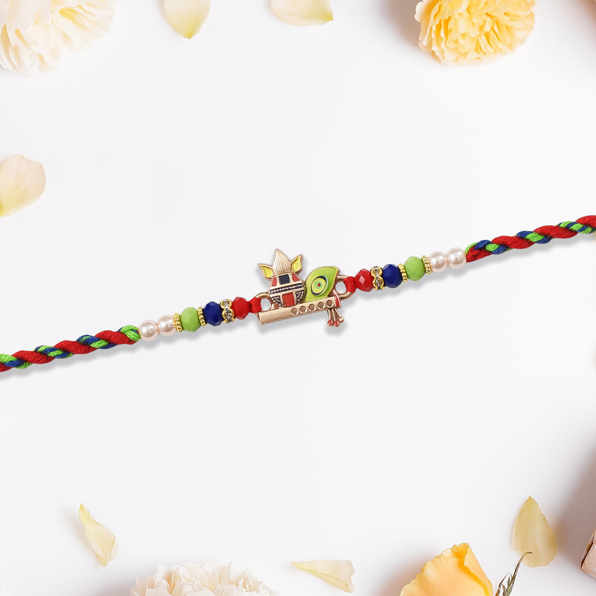 Kalash Rakhi With Flute And Peacock Feather