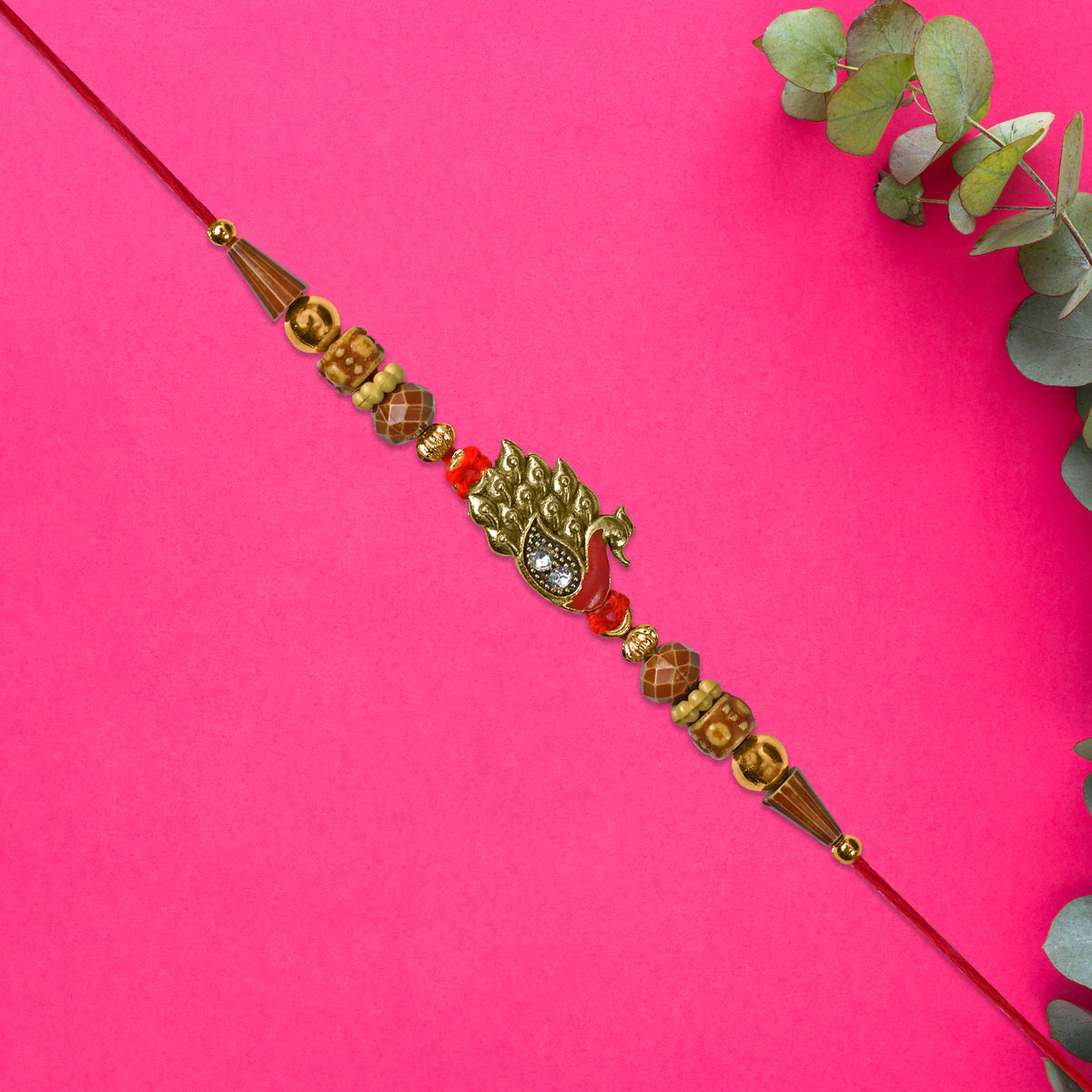 Antique Peacock Feather Rakhi With Beaded Thread