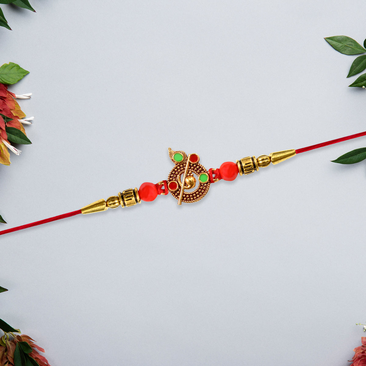 Red Beaded Rakhi With Krishna Symbol