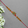 Antique Peacock Feather Rakhi With Beaded Thread