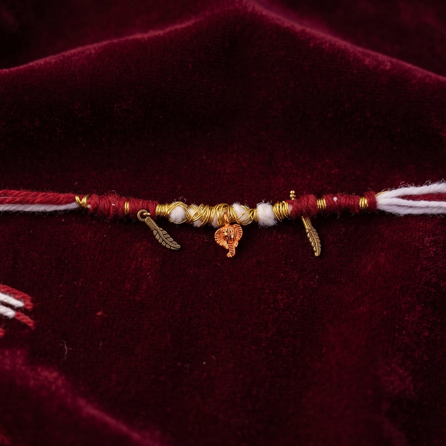 Decorative Thread Rakhi Bracelet With Ganesh  Feather Charms (1 Pc)