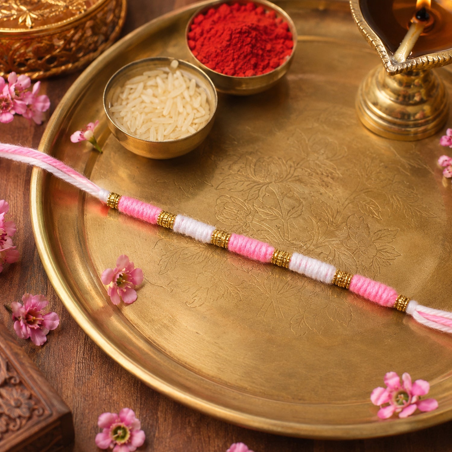 Cute Pink White Thread Rakhi For Brother With Golden Beads (1 Pc)