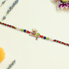 Kalash Rakhi With Flute And Peacock Feather